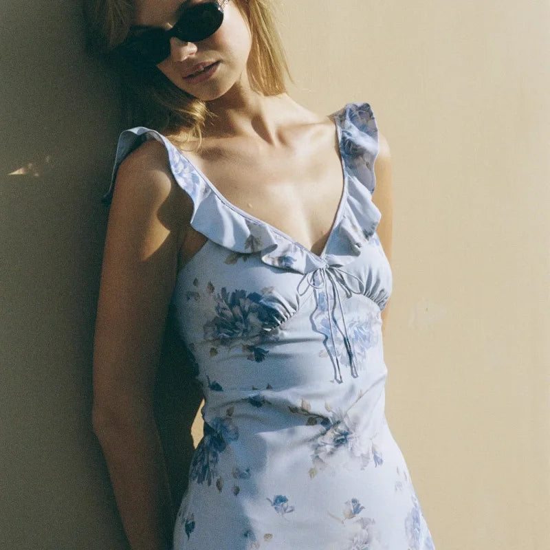 Olive Muse blue floral backless maxi dress, back view showing open back detail