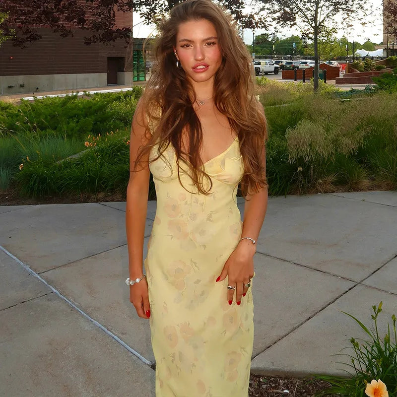 Olive Muse yellow floral maxi dress styled for a beach vacation look