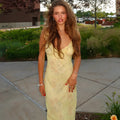 Olive Muse yellow floral maxi dress styled for a beach vacation look
