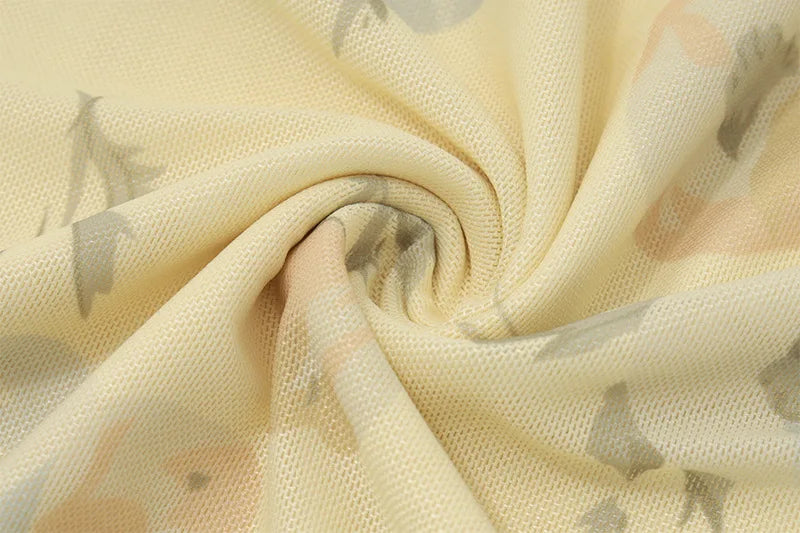 Olive Muse yellow floral maxi dress fabric and print close-up